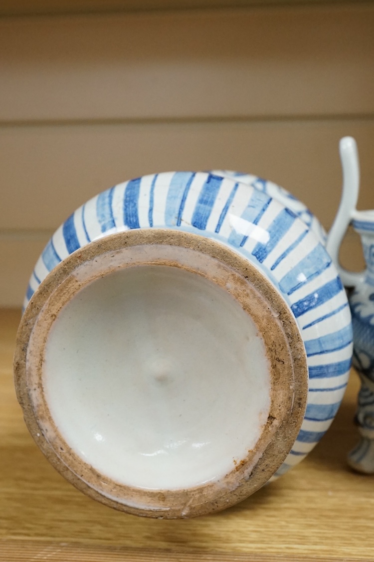 An 18th century Savona maiolica Albarello, inscribed in Manganese; ‘V. litragirio’ (lead oxide), 19cm high